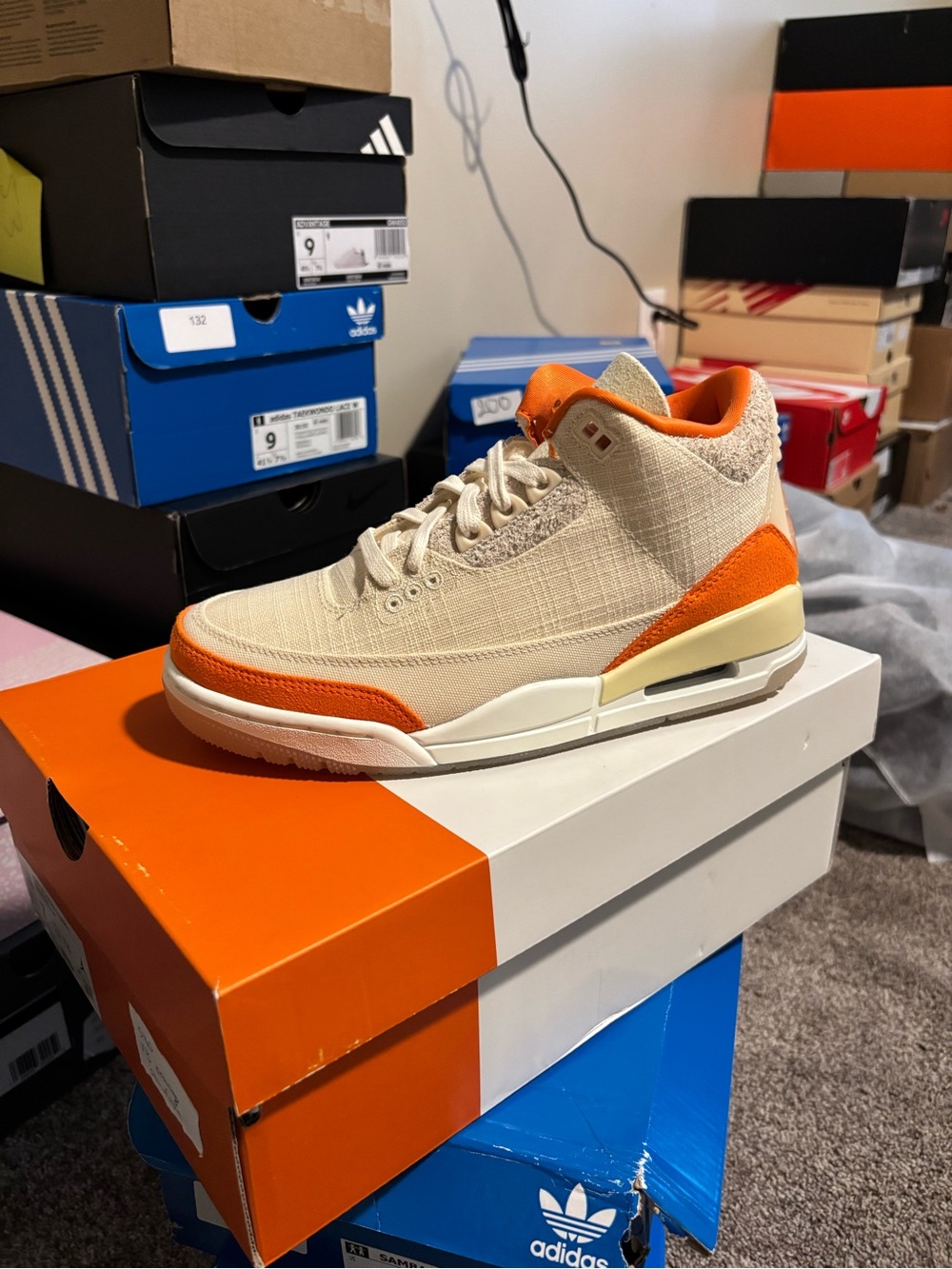 Nike Men’s Sneaker — Cream Upper with Orange Accents